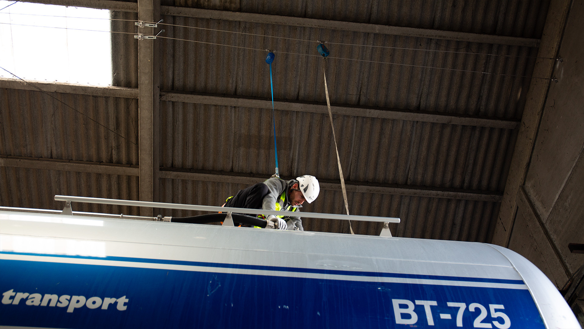 Overhead lifeline over trucks